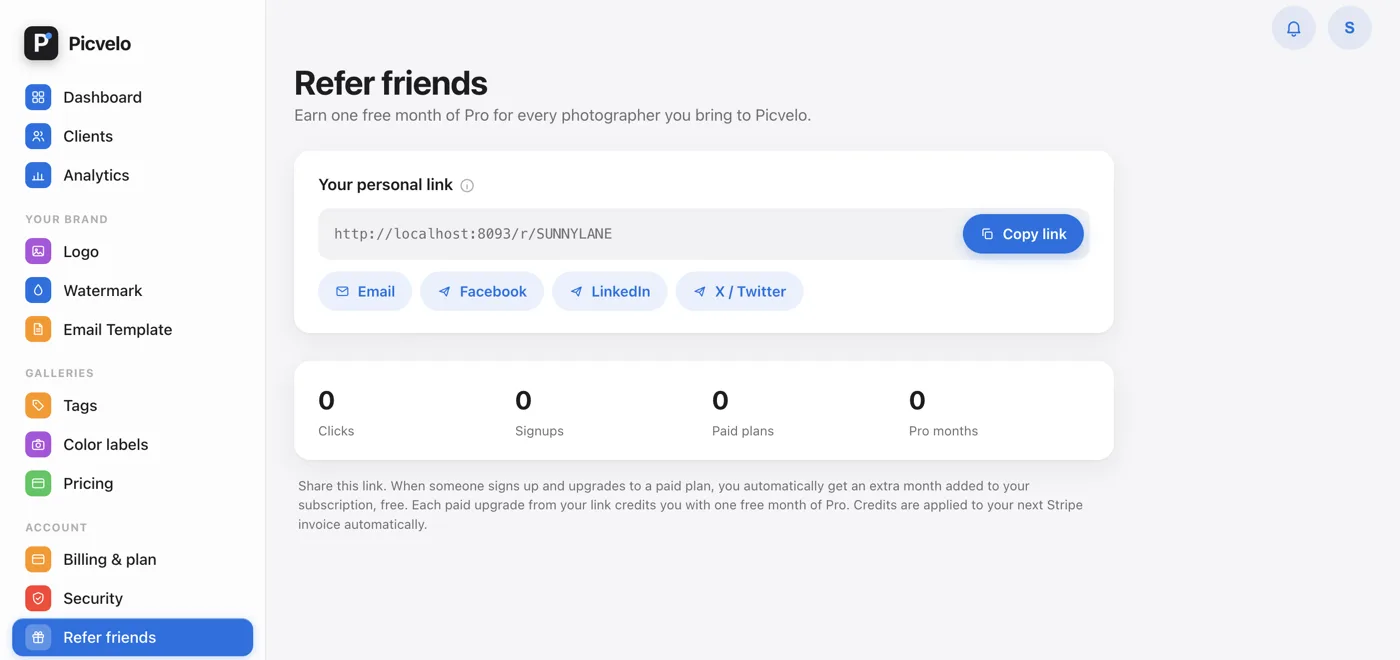 The Refer friends tab with the referral link and counters